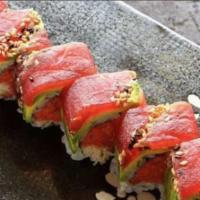Charming Tuna Roll · Spicy tuna crunch top avocado sesame tuna with wasabi sauce.