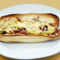 Philly Cheese Steak on a Hero · Grilled steak, onion and peppers, melted American cheese.