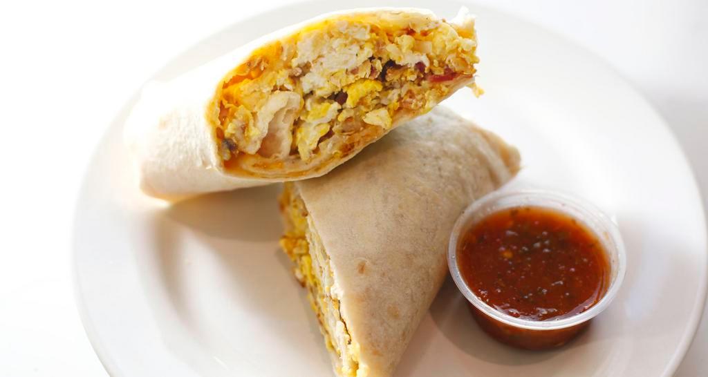 Breakfast Burrito · With 2 eggs, cheese, hash browns and choice of ham or bacon.