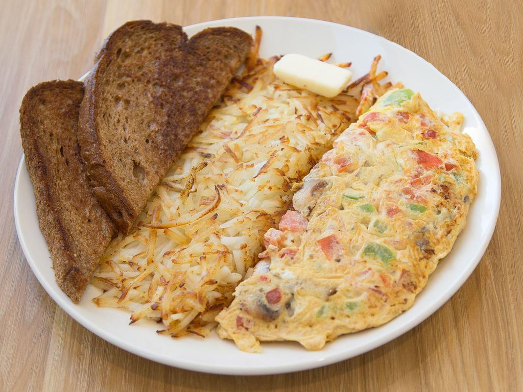 Veggie Omelette · Bell peppers, mushrooms, onions, tomatoes and cheese. Served with buttered toasts. Eggs are original.
