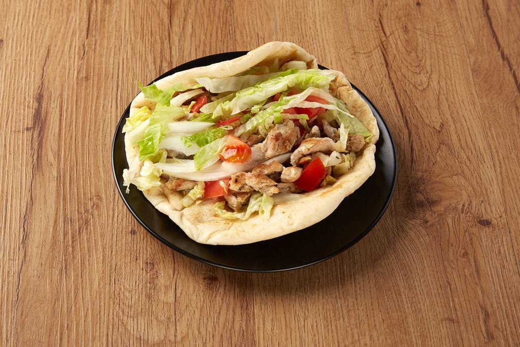 Chicken Gyros · Juicy chicken flame-roasted on a vertical rotisserie.