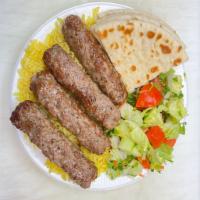 4 Pieces Lamb kofta Plate · Comes with rice, bread, sauce and mix salad.