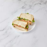Honey Turkey Sandwich · Served with your choice of cheese, lettuce, tomato, mayonnaise and mustard. Choice of on a r...