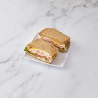 Pepper Turkey Sandwich · Served with your choice of cheese, lettuce, tomato, mayonnaise and mustard. Choice of on a r...