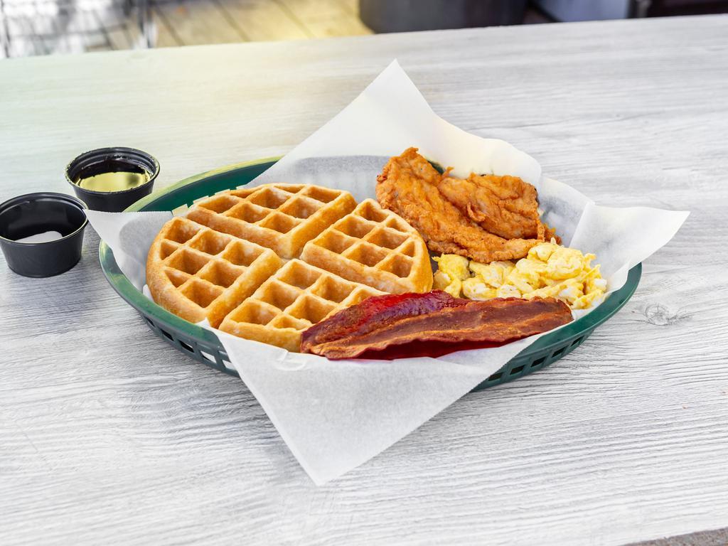 Breakfast Platter · Breaded chicken breast, 3 eggs, 2 slices of bacon, a homemade Belgian waffle, tots or fries, and a side of warm syrup.