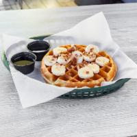 The Nutty Banana Waffle · Belgian waffle, pecans, fresh bananas, warm maple syrup, butter, and powdered sugar.
