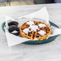 Chocoholic Waffle · Belgian waffle loaded with chocolate chips, chocolate syrup, whipped cream, maple syrup, but...