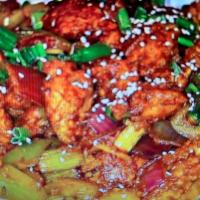 Chili Chicken · Cooked with spicy blend of green onion and green chilli.