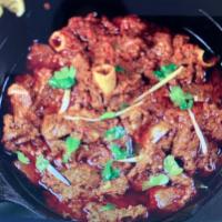 Lamb Karahi · Cooked with tomatoes, onion and bell pepper.