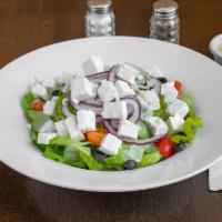 Greek Salad · Romaine hearts, cucumbers, cherry tomatoes, red onions, feta cheese, black olives and lemon ...