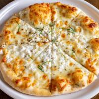 Bianca Pizza · Olive oil, oregano dash, melted mozzarella generously topped with ricotta cheese.