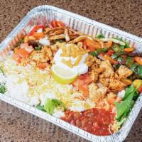 Large Santa Fe Rice Bowl · Feeds 2-3. Fajita chicken, tomatoes, romaine lettuce, spinach, green and red peppers, onions...