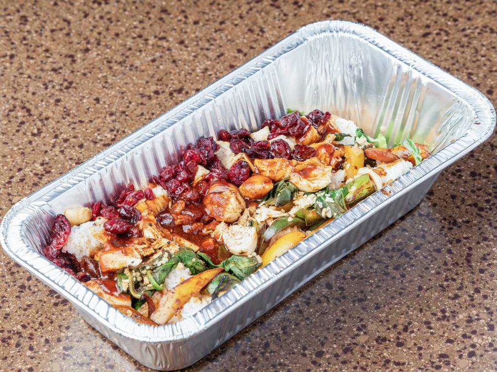 Medium Cran Jerk Rice Bowl · Feeds 1-2. Dried cranberries garlic roasted spinach green and yellow peppers pan-seared chicken breast with Jamaican jerk BBQ on top. 