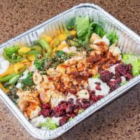 Large Cran Jerk Rice Bowl · Feeds 2-3. Dried cranberries garlic roasted spinach green and yellow peppers pan-seared chic...