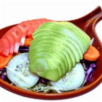 Mix Avocado Salad · Avocado, tomatoes, lettuce, red cabbage, cucumber, carrots and homemade dressing.