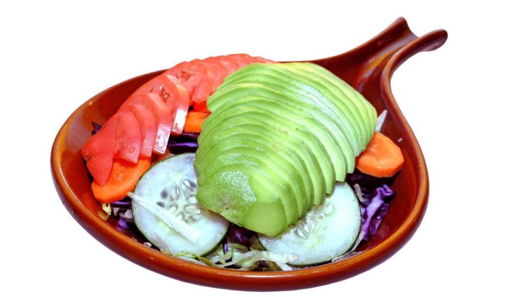 Mix Avocado Salad · Avocado, tomatoes, lettuce, red cabbage, cucumber, carrots and homemade dressing.
