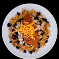 NAKED CHICKEN ENCHILADA · Mexican spiced chicken breast and authentic sauce served over rice and black beans with no t...