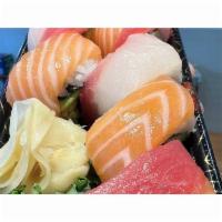 Rainbow Roll · California roll and Yellowfin tuna, Iceland salmon, Red snapper