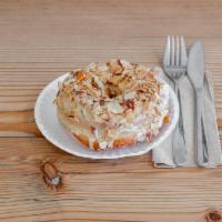 Dulce de Leche  Doughnut w/ Toasted Almonds · Sweet house-made dulce the leche glace with crunchy sliced almonds