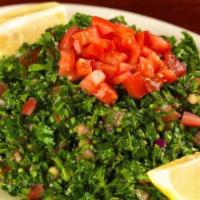 Tabouleh (Vegan) · Chopped parsley, mint, onion, bulgur wheat, lemon and olive oil. Ask to omit the bulgur for ...