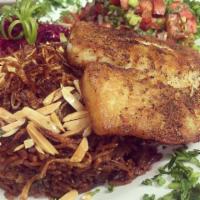 Sayadiyya · Gluten-free. The fisherman's meal is rice sauteed with shredded grouper, caramelized onion, ...