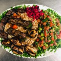 Grilled Combo · A combination platter of our grilled entrees, kabobs, chicken kabob and shish kabob. Served ...