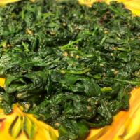 Sautéed Spinach (Vegan and GF) · With garlic and olive oil.