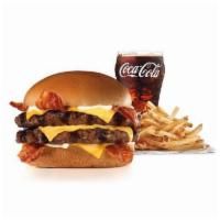 2/3lb Monster Thickburger® Combo · Two 1/3lb char-broiled 100% black Angus beef patties, four strips of bacon, three slices of ...