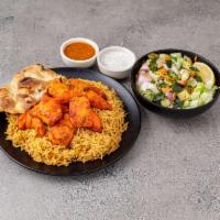 37. Two Chicken Tikka Platter · Served with rice, salad and sauces