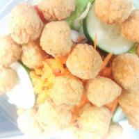 36. Popcorn Chicken Salad with Water · Served with water.