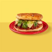 Chorizo & Egg Torta · With caramelized onion & salsa verde.