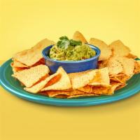 Guacamole & Chips · Corn tortilla chips and a side of guacamole.