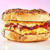 Bigg Belly Grand Slam  · 3 eggs, cheese, hash browns, ham, bacon and sausage.