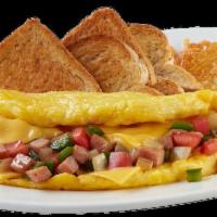 Western Omelette Platter  · Made with 4 eggs, served with your choice of hash browns, home fries or sliced tomato. Inclu...