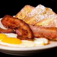 French Toast Platter · Two pieces of French Toast with 2 eggs and your choice of Applewood smoked bacon (3 strips),...