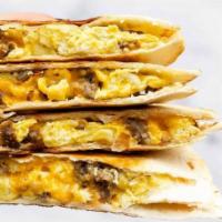 Breakfast Quesadilla · Flour tortillas stuffed with 2 scrambled eggs, melted cheese, peppers & onions, hot salsa an...