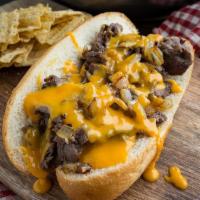 Original Philly Cheese Steak Sandwich · Tender sliced beef with sauteed mushrooms, green peppers, caramelized onions and melted chee...
