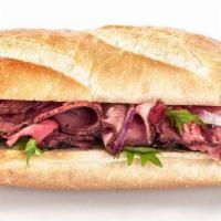 Roasted Beef Sandwich · Roasted Beef, lettuce, mayonnaise, tomato, onion a bread roll.
