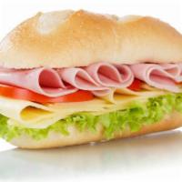 Ham Sandwich · Ham, Lettuce, mayonnaise, tomato, onion on a roll.
