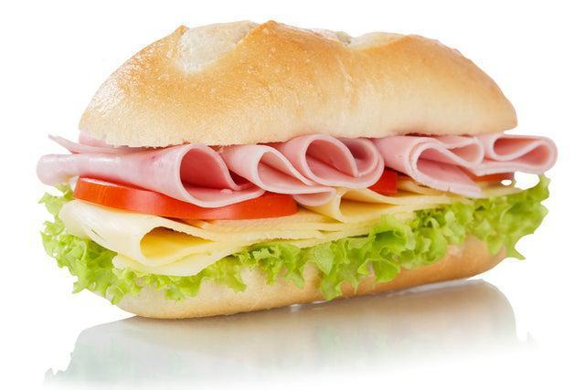 Ham Sandwich · Ham, Lettuce, mayonnaise, tomato, onion on a roll.

