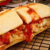 Chicken Parmesan Sandwich · Home made chicken cutlets prepared with tomato sauce topped with melted mozzarella cheese
