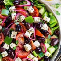 Greek Salad · Lettuce, tomato, feta cheese, Kalamata olives, cucumber and onions.