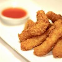 Fried Calamari · Traditional squids battered and fried until golden brown. Served with Thai mustard sauce.