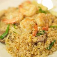 Shrimp Fried Rice · Fried rice sauteed with shrimp, Thai spices, egg, tomatoes and onions.