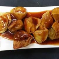 10 Wonton in Hot Szechuan Sauce · Stuffed Chinese dumpling.