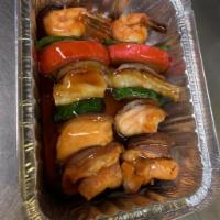 25. Kushiyaki · Broiled shrimp, salmon and scallop skewers in teriyaki sauce.
