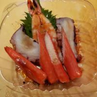 36. Sunomono · Assorted thin-sliced seafood with ponzu sauce.