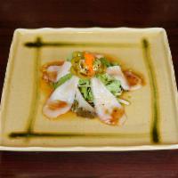 43. Yellowtail Jalapeno Appetizer · Thin-sliced yellowtail with jalapeno and served with special sauce.