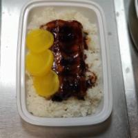 80. Unagi Don · Broiled eel over rice with oshinko.