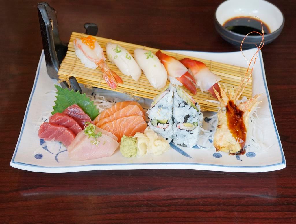 103. Sushi and Sashimi Combo · 5 pieces of sushi, 8 pieces of sashimi and a California roll.